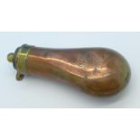 A copper powder flask, with initials and dated 1849,