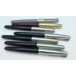 Seven Parker 51 ink pens,