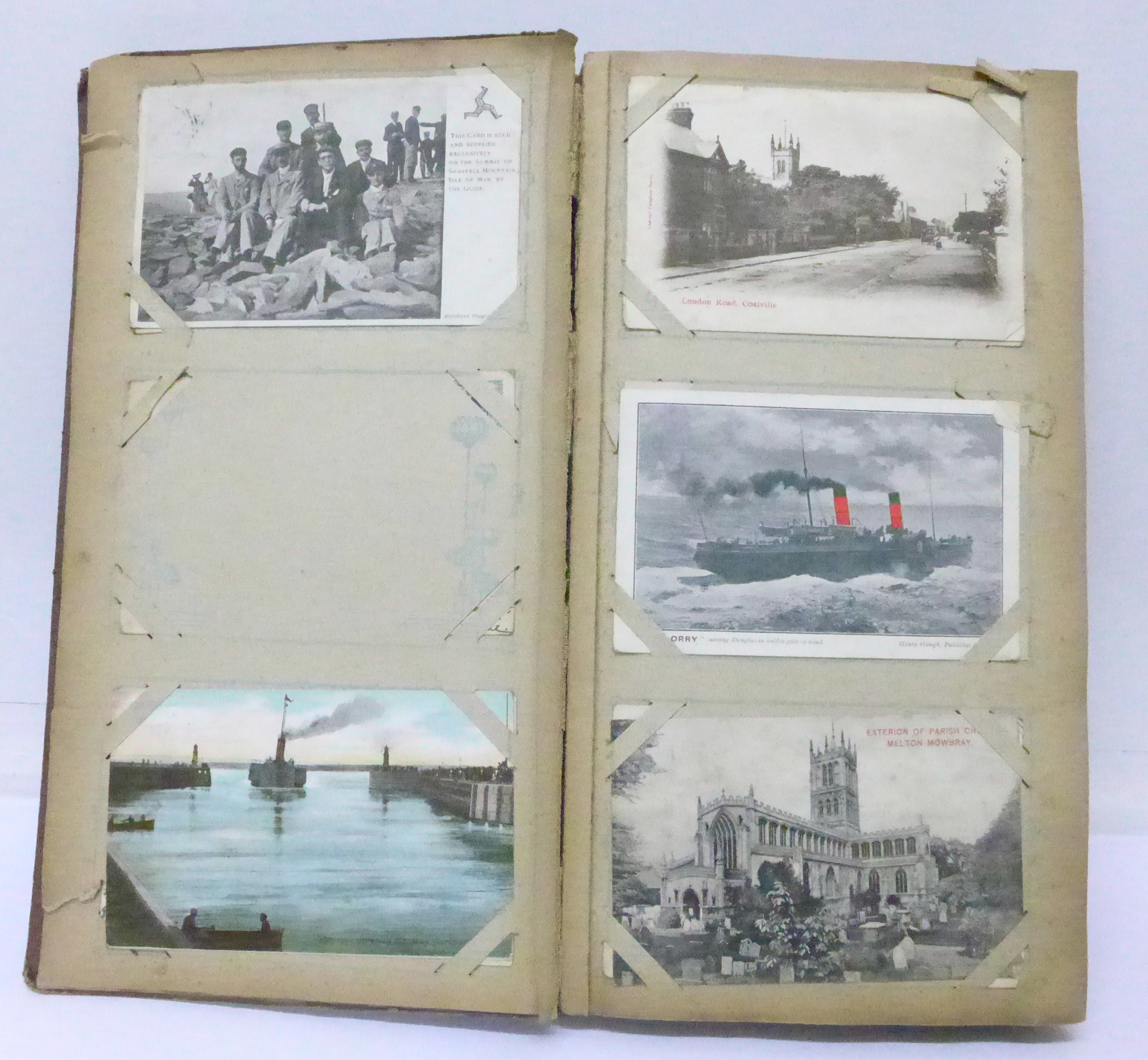 An album of 178 postcards, early 20th Century including street views,