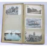 An album of 178 postcards, early 20th Century including street views,