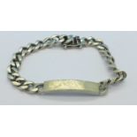 A silver ID bracelet,