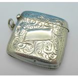 An embossed silver vesta case,