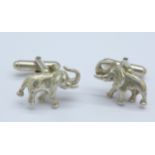 A pair of hallmarked silver elephant cufflinks