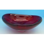 A Whitefriars ruby glass dish, 1960's by Geoffrey Baxter,