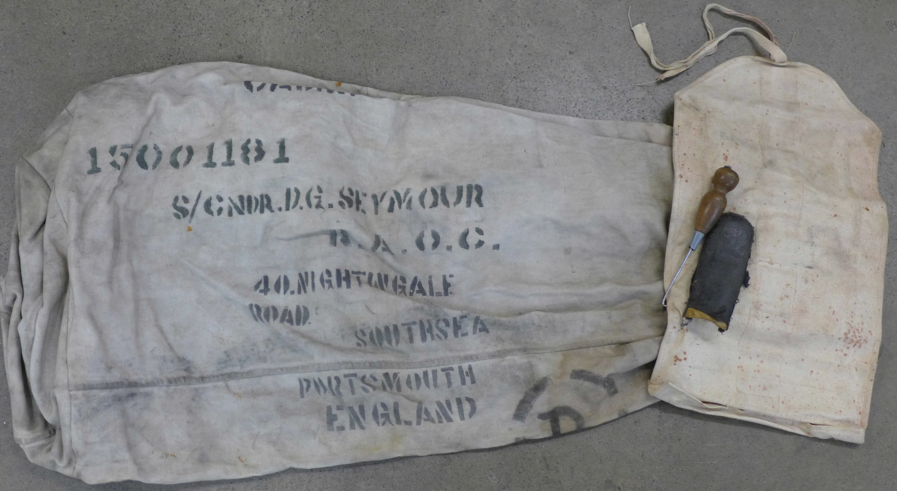 A WWII kit bag with 'D' ring and wash bag, to S/Cndr. D.G. Seymour R.A.O.C.