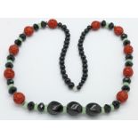 A hardstone and cinnabar bead necklace