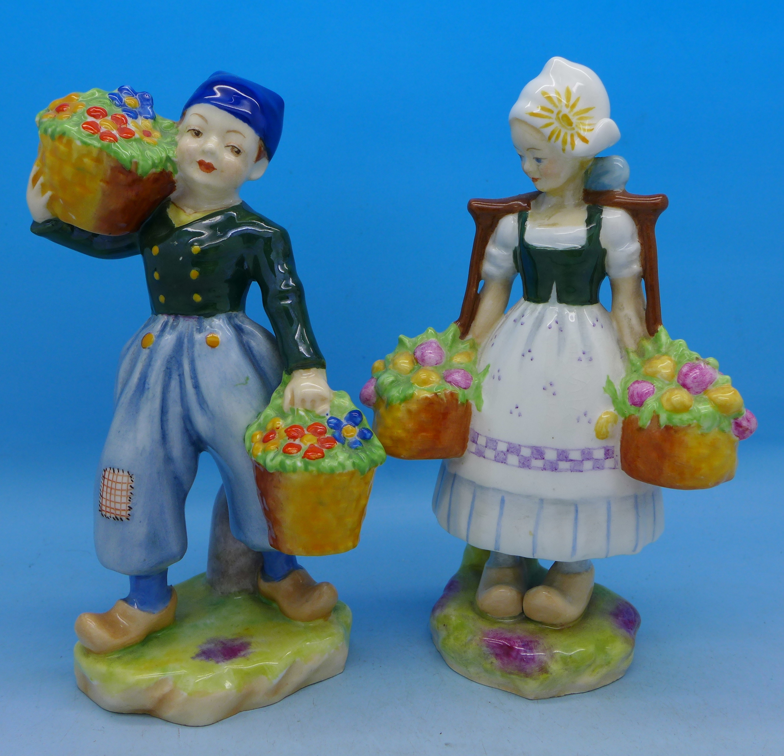 A pair of Royal Worcester figures, Dutch boy and Dutch girl, 2923 and 2922,