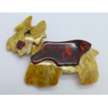 An Art Deco style dog brooch