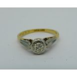 An 18ct gold and platinum set Art Deco diamond solitaire ring, 2.