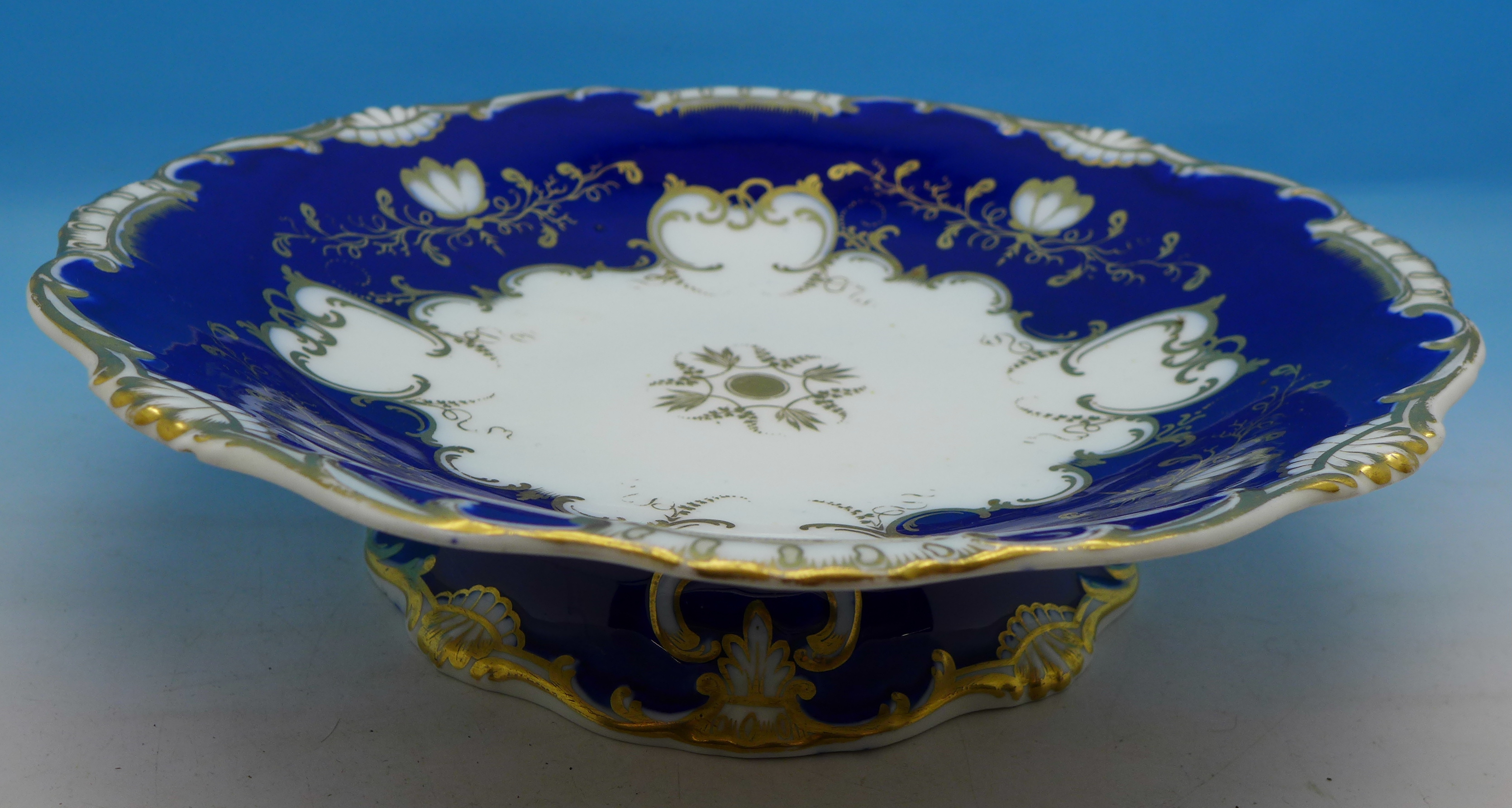 Two Victorian blue and gilt tazzas and six matching plates, probably Coalport and a small tureen, - Image 2 of 3