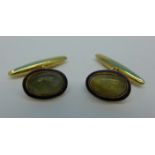 A pair of 9ct gold, cats eye and enamel cufflinks,