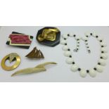 Art Deco style jewellery including brooches and buckles