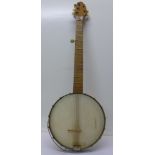A banjo with oak neck,