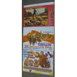 Three Western film posters comprising Guns For San Sebastian, The Hallelujah Trail, Lawman,