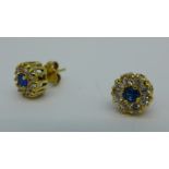 A pair of 18ct gold earrings, 3.