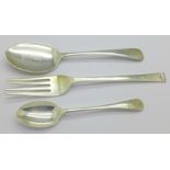 Two silver spoons and a silver fork,
