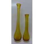 Two tall amber glass vases in the style of Kosta,