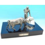 A Spanish silver model of a matador and bull, with plaque marked Los Monteros 1965,
