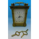 A Matthew Norman brass cased carriage alarm clock, repeating mechanism,