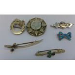 Six silver brooches including three Victorian