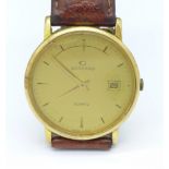 A 9ct gold cased Garrard quartz wristwatch, with inscription,