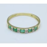 A 9ct gold, emerald and diamond ring, 0.