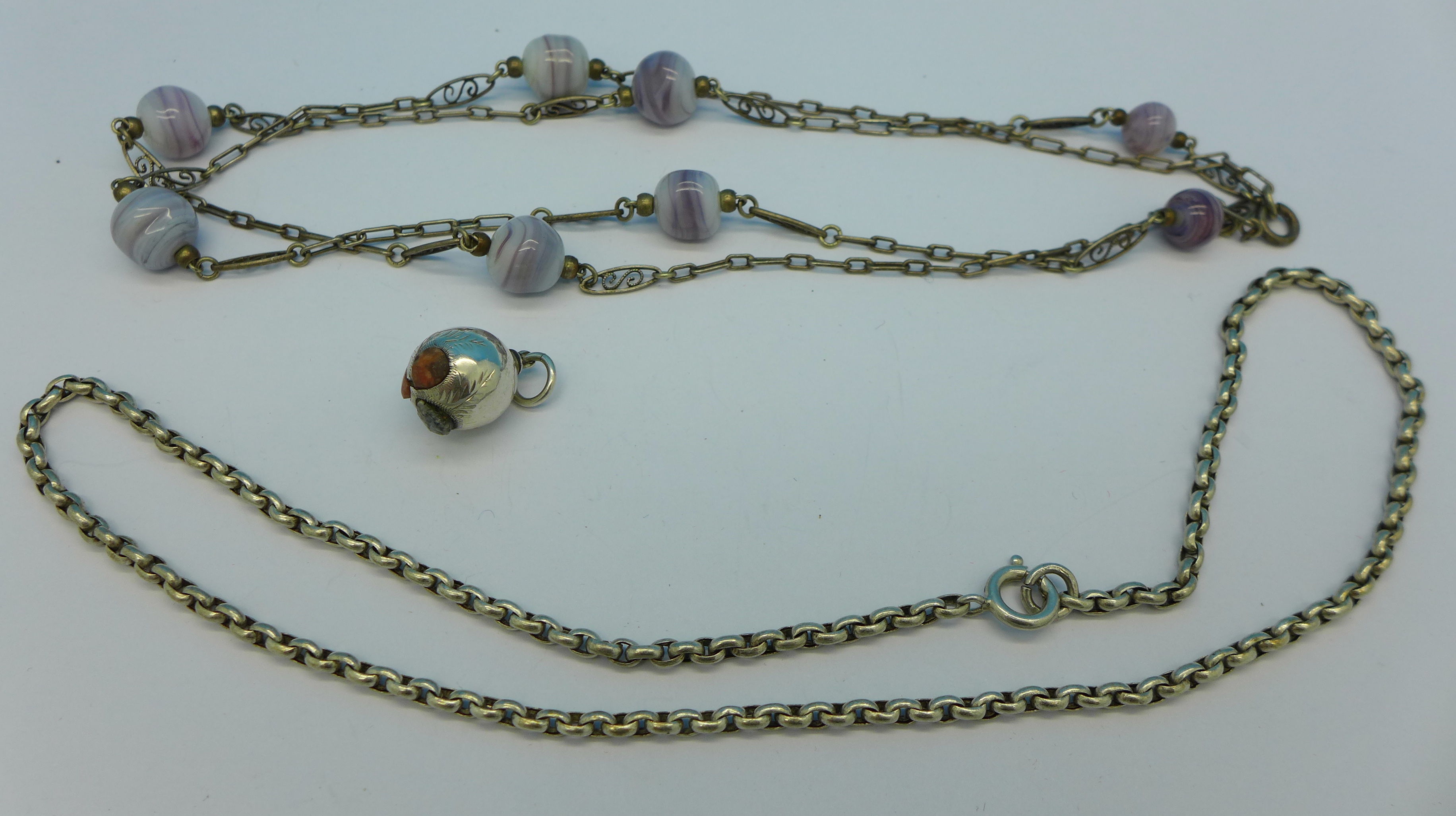 A silver neck chain,