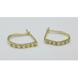 A pair of 9ct gold and diamond earrings