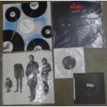 A Queen Body Language promotional use only LP record and two Stranglers LP records,