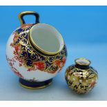 Two miniature Royal Crown Derby vases