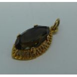 A 9ct gold, smoky quartz pendant, 1.