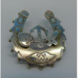 A Victorian silver horseshoe faith, hope and charity brooch, Birmingham 1900,