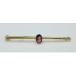 A 9ct gold and garnet brooch, 1.