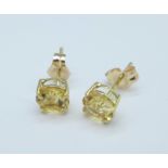 A pair of 9ct gold and citrine earrings