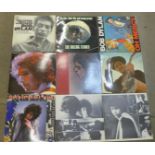 Seven Bob Dylan LP records and one Rolling Stones LP record