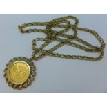 A 1994 full sovereign in a 9ct gold mount on a 9ct gold chain, chain a/f, 21.