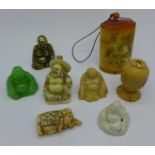 A collection of carved Buddha figures, a vegetable ivory tape measure holder, (no tape) and an inro,