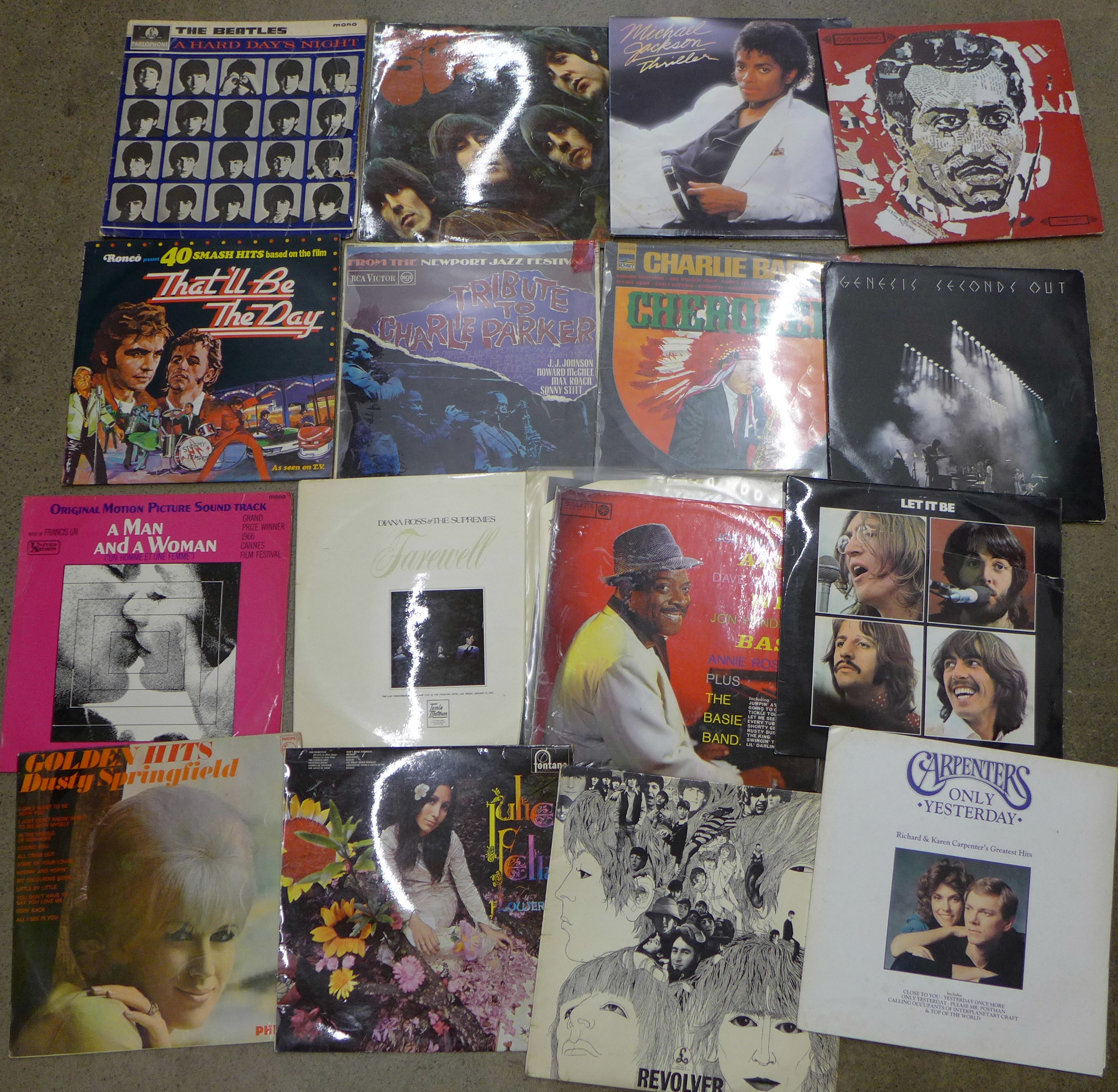 Thirty-two LP records, including The Beatles, Genesis, Diana Ross, etc.