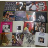 Thirty-two LP records, including The Beatles, Genesis, Diana Ross, etc.