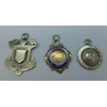 Three silver fobs including one Victorian