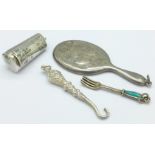 A silver cheroot holder case, Birmingham 1905, a small silver mirror back a/f,