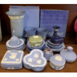 A large collection of Wedgwood Jasperware, vases, candlestick, pin dishes, lighter, etc.