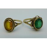 A yellow metal and green stone ring and a 9ct gold and orange stone ring, 3.