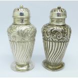 A pair of Victorian silver peppers, London 1887,