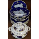 Two Victorian blue and gilt tazzas and six matching plates, probably Coalport and a small tureen,