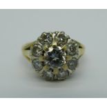 An 18ct gold, diamond cluster ring, approximately 1.3ct diamond weight, 5.