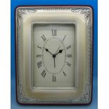A silver fronted clock with alarm, stamped 925, by Sagni,