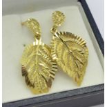 A pair of 9ct gold leaf earrings,