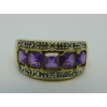 A 9ct gold, amethyst and diamond ring, 4.