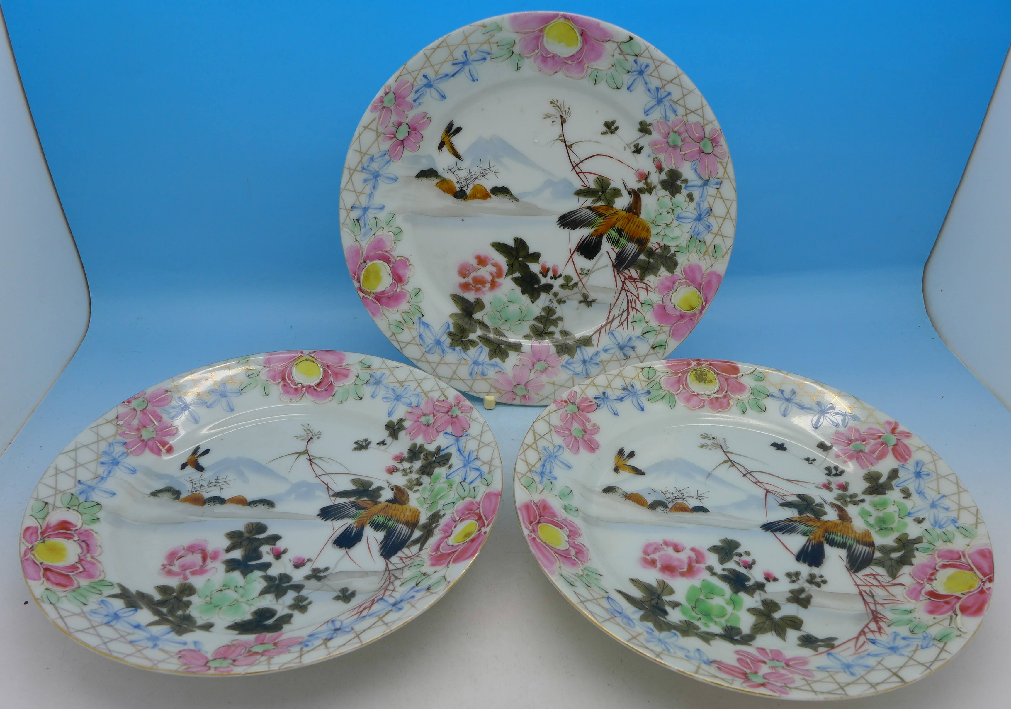 Three oriental plates,